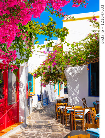 One of the cozy streets of Plaka town. Milos island, Greece 121647633