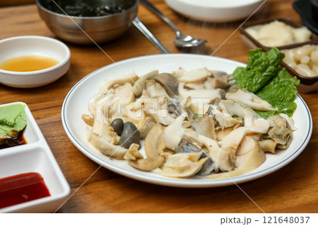 Korean seafood food. Boiled conch sashimi Korean seafood food. Boiled conch sashimi 121648037