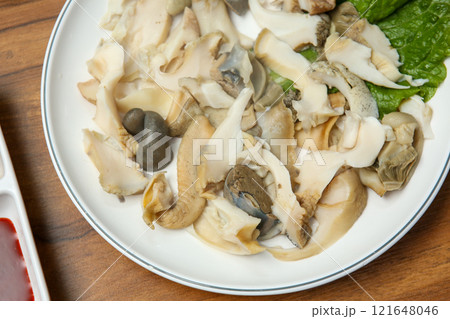 Korean seafood food. Boiled conch sashimi Korean seafood food. Boiled conch sashimi 121648046