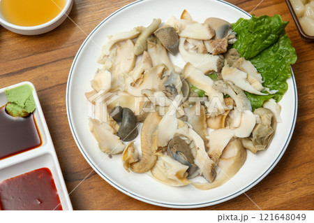 Korean seafood food. Boiled conch sashimi Korean seafood food. Boiled conch sashimi 121648049