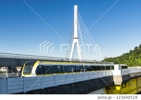 A train traveling on the Circular Line (Yellow Line) metro in New Taipei City, Taiwan, The metro with driverless technology. 121648528