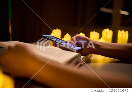 Experience a serene ambiance created by a combination of candlelight and advanced technology 121651471