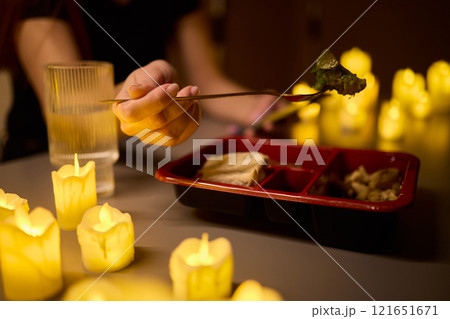 Enjoy a Romantic Candlelit Dining Experience with your Favorite Takeout Meal for Two 121651671