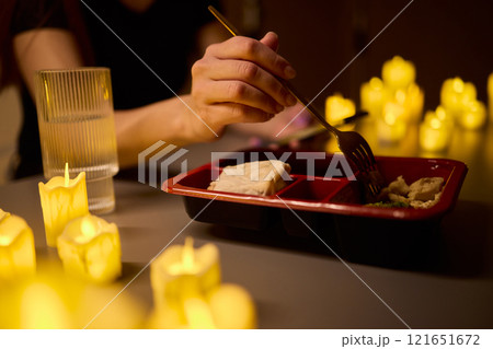 Enjoy a Romantic Candlelit Dining Experience with your Favorite Takeout Meal for Two 121651672