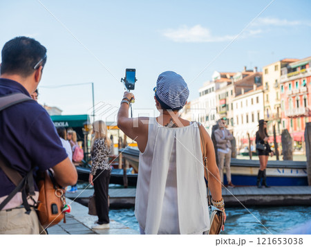 Landscape with Rialto Bridge and gondola Grand Canal in Venice, Italy, Europe. 121653038