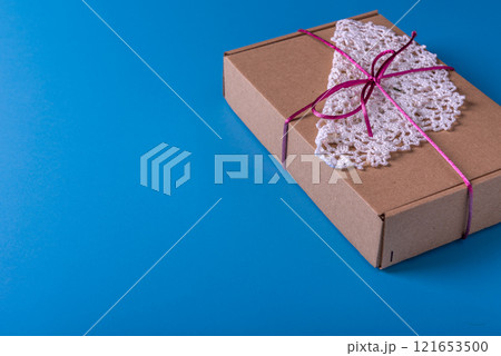 Present box, decoration of gift on table, top view with copy space Present box, decoration of gift on table, top view with copy space 121653500