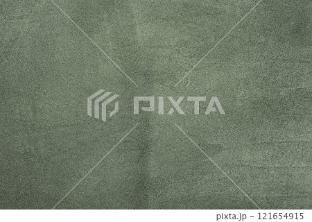 Green suede as a background. Suede leather macro photo khaki color. 121654915