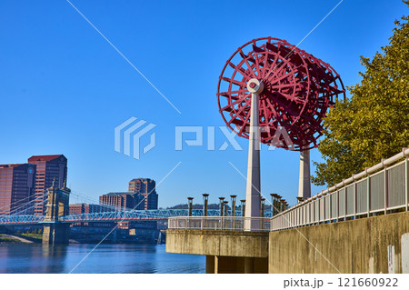 Red Paddle Wheel and Suspension Bridge on Ohio River Eye-Level View 121660922