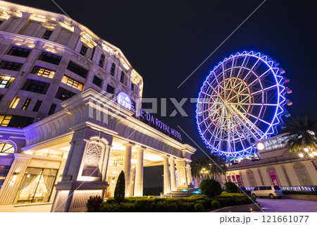 Night view of the E-DA Royal Hotel and the Ferris wheel at the E-DA Theme Park in Dashu, Kaohsiung, Taiwan. Night view of the E-DA Royal Hotel and the Ferris wheel at the E-DA Theme Park in Dashu, Kaohsiung, Taiwan. 121661077