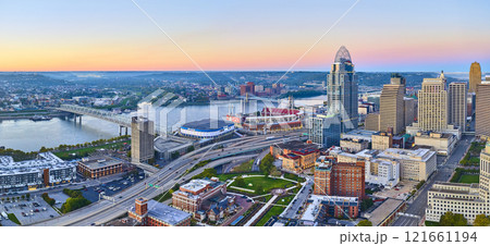 Aerial Sunrise over Cincinnati Skyline with Ohio River and Sports Stadiums Aerial Sunrise over Cincinnati Skyline with Ohio River and Sports Stadiums 121661194