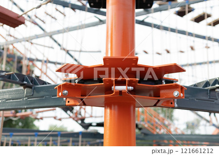 Children Playground with Modern Slide, Rope Net Bridge, Climbing Swings, Climbers. Empty Wooden Playground made of Eco Materials 121661212