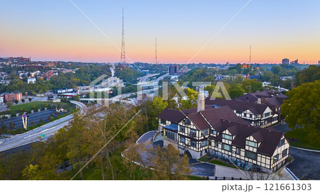Aerial of Tudor Architecture with Urban Sunset in Cincinnati 121661303