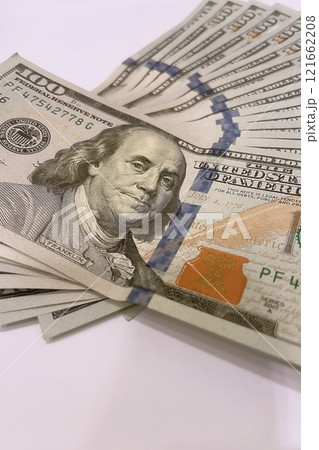 US Dollar Banknotes.A close-up view of various US dollar banknotes. Finance and economy concept. US Dollar Banknotes.A close-up view of various US dollar banknotes. Finance and economy concept. 121662208