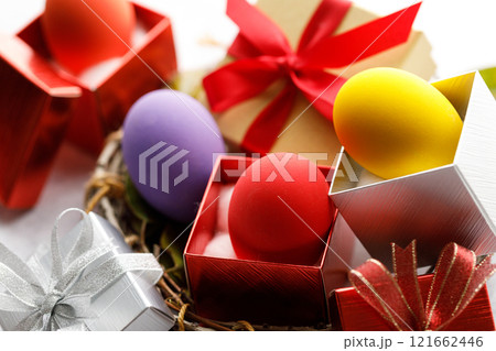 Colorful easter egg and gift boxes Colorful easter egg and gift boxes 121662446
