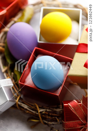 Colorful easter egg and gift boxes Colorful easter egg and gift boxes 121662449