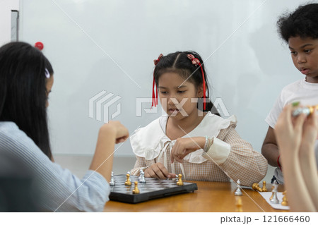 children playing chess board game education strategy classroom. Training for brain development. 121666460