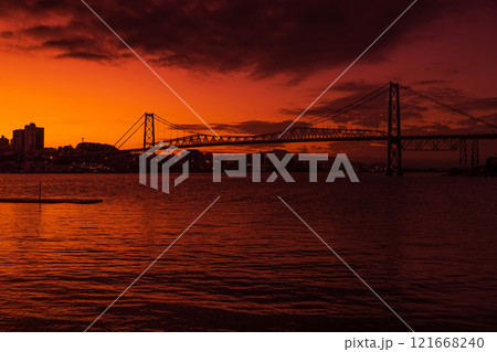Old Hercilio luz cable bridge with sunset in Florianopolis 121668240
