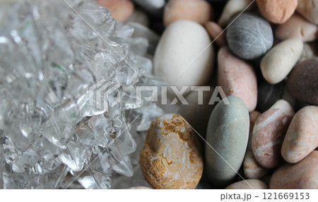 Growths On A Icicle Lying On Smooth Pebbles Macro Shot Stock Photo 121669153