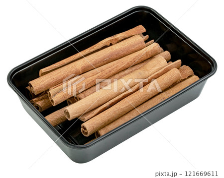 cinnamon sticks in plastic box isolated cinnamon sticks in plastic box isolated 121669611