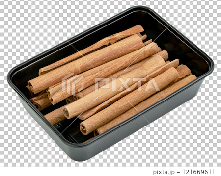 cinnamon sticks in plastic box isolated cinnamon sticks in plastic box isolated 121669611