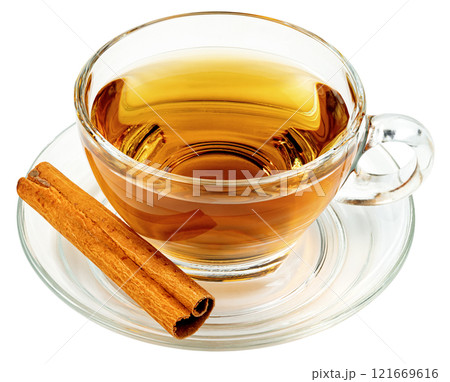 Transparent cup of tea with cinnamon sticks isolated Transparent cup of tea with cinnamon sticks isolated 121669616