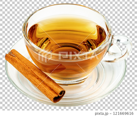 Transparent cup of tea with cinnamon sticks isolated Transparent cup of tea with cinnamon sticks isolated 121669616