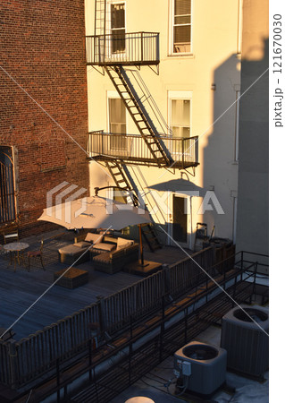Open parasol on the rooftop in New York Open parasol on the rooftop in New York 121670030