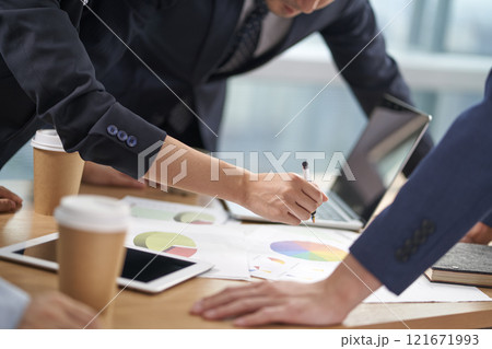 team of asian business people meeting in office 121671993