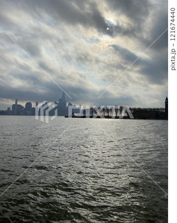 View of the skyscrapers of Manhattan from the water, New York landscape from the waterfront View of the skyscrapers of Manhattan from the water, New York landscape from the waterfront 121674440