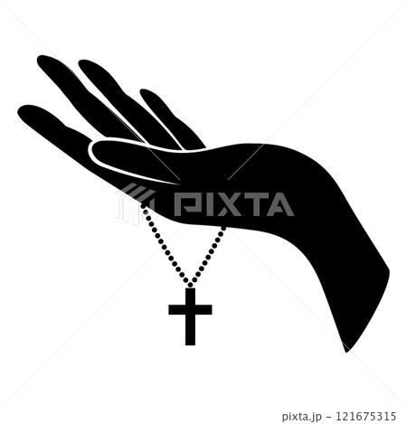Hand with a Christian cross on a chain 121675315