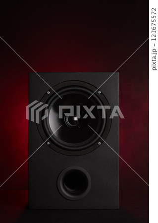 Black speaker and red smoke 121675572