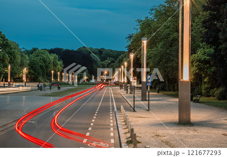 The Boulevard du centenaire or Eeuwfeestlaan by night with red light traisl for a car passing by, Laeken, Brussels Capital Region, Belgium The Boulevard du centenaire or Eeuwfeestlaan by night with red light traisl for a car passing by, Laeken, Brussels Capital Region, Belgium 121677293