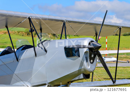 Vintage viplano single-engine plane at the aerodrome 121677691