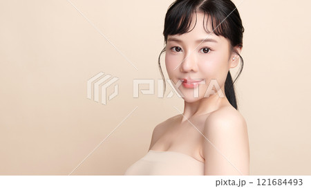 Beautiful young asian woman with clean fresh skin on beige background, Face care, Facial treatment, Cosmetology, beauty and spa, Asian women portrait. 121684493