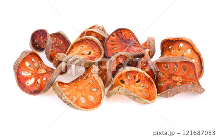 Dry bael fruit isolated on white background 121687083