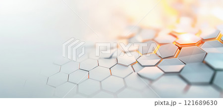 Geometric hexagonal shapes are arranged in a dynamic pattern, illuminated by soft light. This creates a modern and abstract visual effect suitable for digital design. 121689630