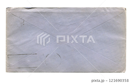 front view of old closed aged blue DL paper envelope with wrinkles and torn edges isolated on white 121690358