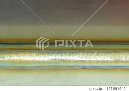 Close up scene the welding line on the metal plate. 121691642
