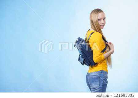 Young woman going to school Young woman going to school 121693332