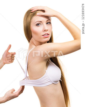 Woman wearing too big bra Woman wearing too big bra 121693474