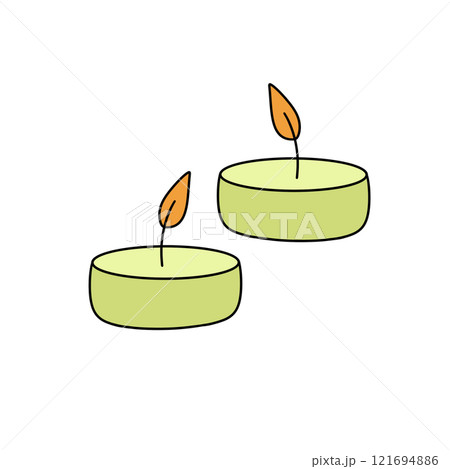 Two candles with a leaf on top of them Two candles with a leaf on top of them 121694886