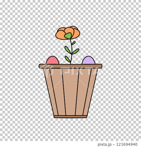 A flower pot with a flower and two eggs in it 121694940