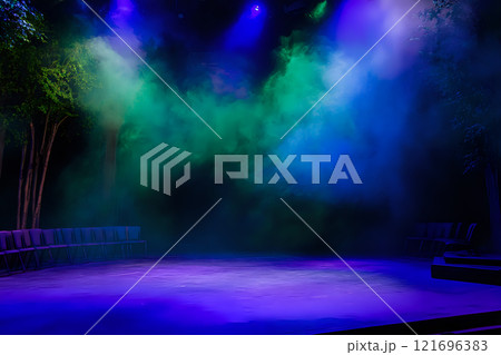 Stage background with swirling royal purple mist and deep emerald tones 121696383