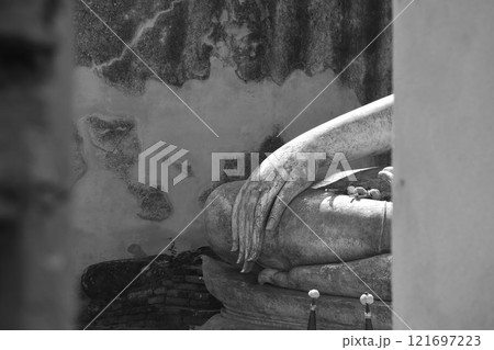 hand of ancient Buddha at Wora Chet Tha Ram temple travel location in Thailand hand of ancient Buddha at Wora Chet Tha Ram temple travel location in Thailand 121697223