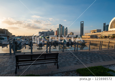 Abu Dhabi Modern Skyline Reflected in Al Bateen Marina UAE capital city 121698572