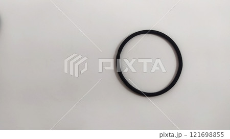 Subject shot of black scrunchies. rubber band. The vogue accessories are isolated on the white background. Subject shot of black scrunchies. rubber band. The vogue accessories are isolated on the white background. 121698855