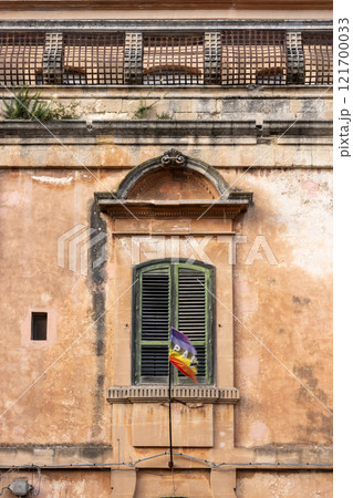 Window of an old building and rainbow flag Pace (Peace) Window of an old building and rainbow flag Pace (Peace) 121700033