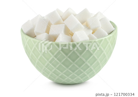 Sugar cubes in a ceramic bowl isolated on white background Sugar cubes in a ceramic bowl isolated on white background 121700334
