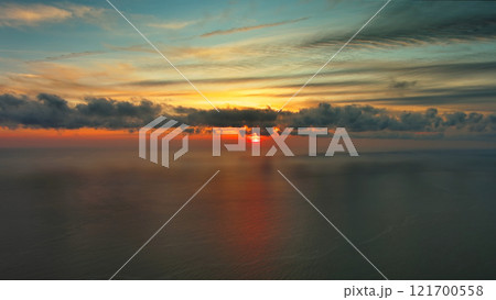 Sea surface and beautiful sunset 121700558