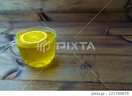 Green tea with lemon in a mug. 121700679